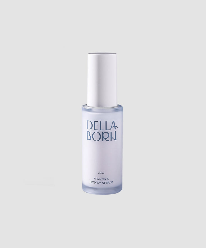 DELLA BORN Manuka Honey Serum 30ml bottle with 36% New Zealand Manuka honey, collagen extract, and hyaluronic acid for skin hydration, elasticity, and brightening. 