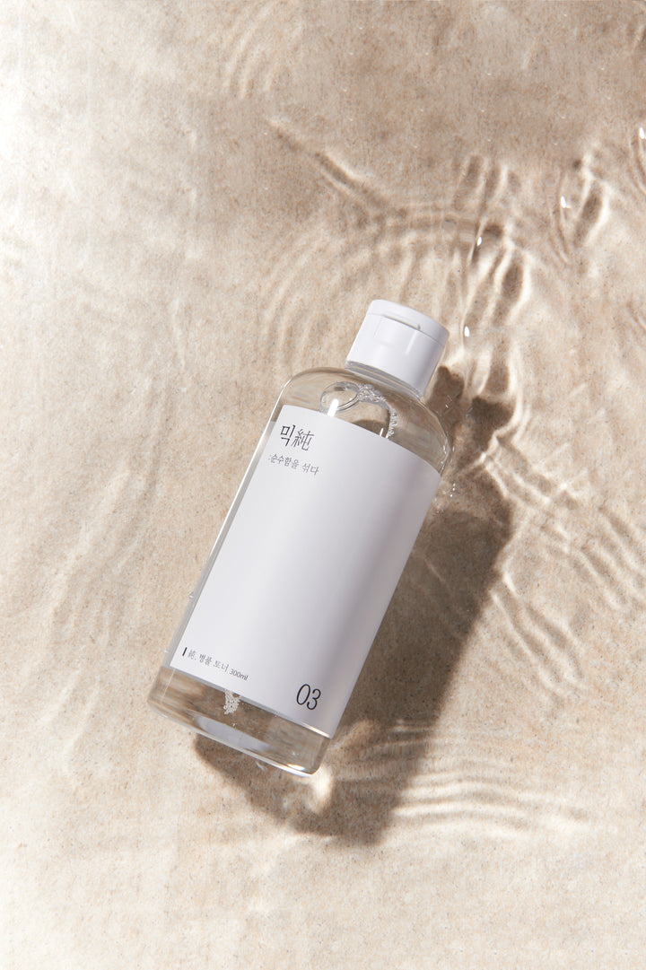 Mixsoon Centella Asiatica Toner 300ml bottle with label featuring product name and description, designed for soothing and hydrating sensitive, acne-prone skin. 