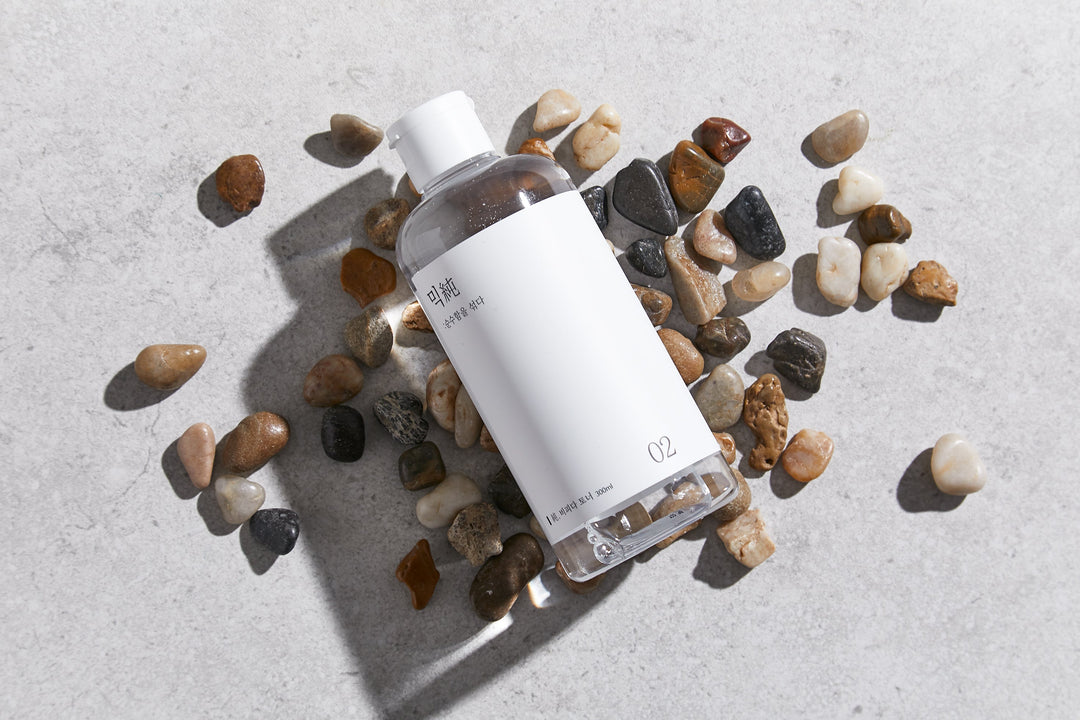 Mixsoon Centella Asiatica Toner 300ml bottle with label featuring product name and description, designed for soothing and hydrating sensitive, acne-prone skin. 