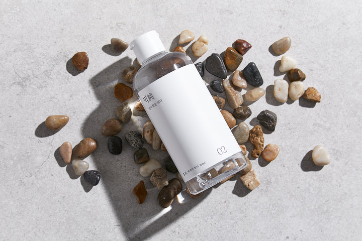 Mixsoon Centella Asiatica Toner 300ml bottle with label featuring product name and description, designed for soothing and hydrating sensitive, acne-prone skin. 
