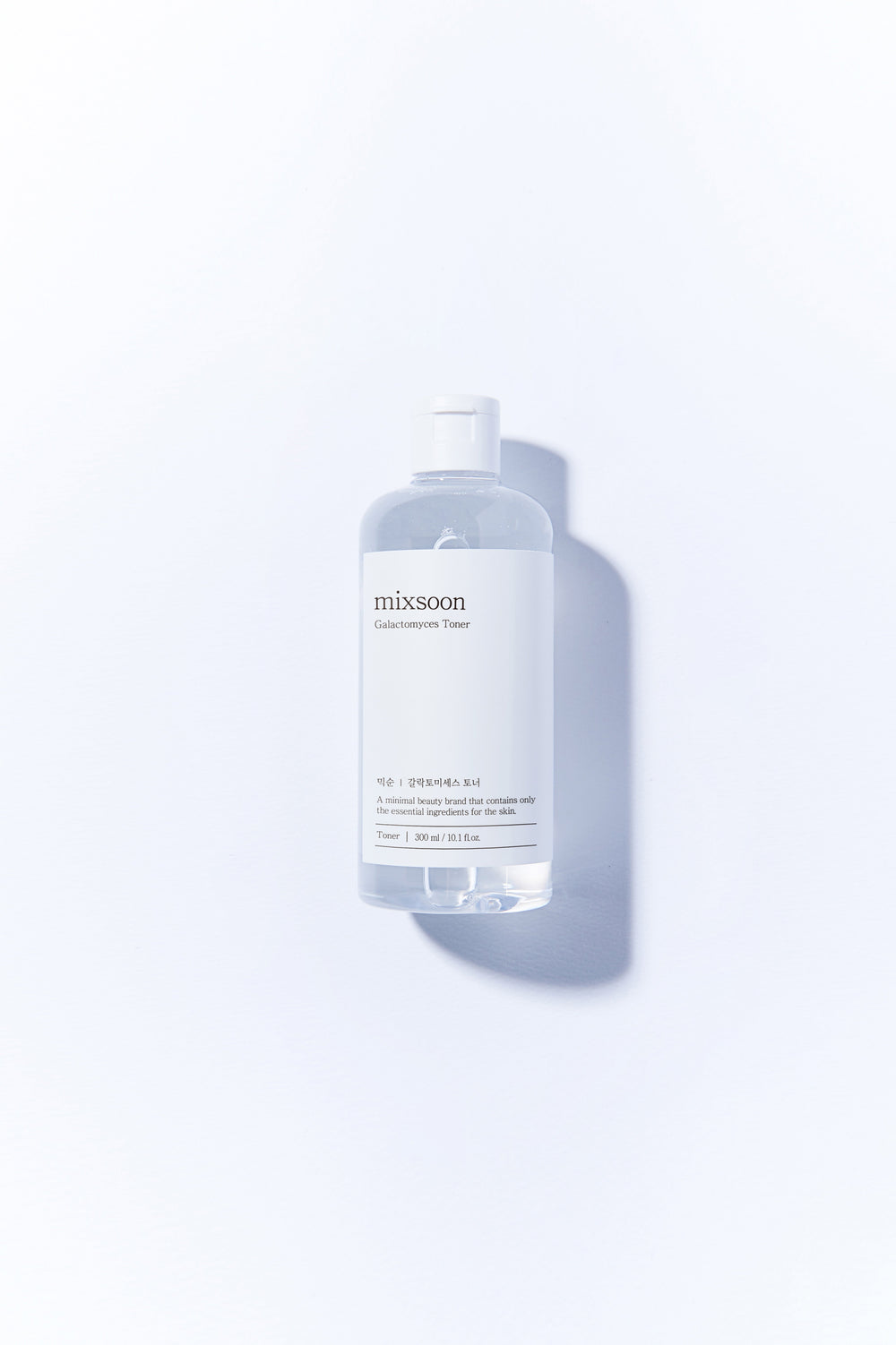Mixsoon Galactomyces Toner 300ml bottle with label highlighting its key benefits: brightening skin tone, reducing discolorations, hydrating, and moisturizing. 