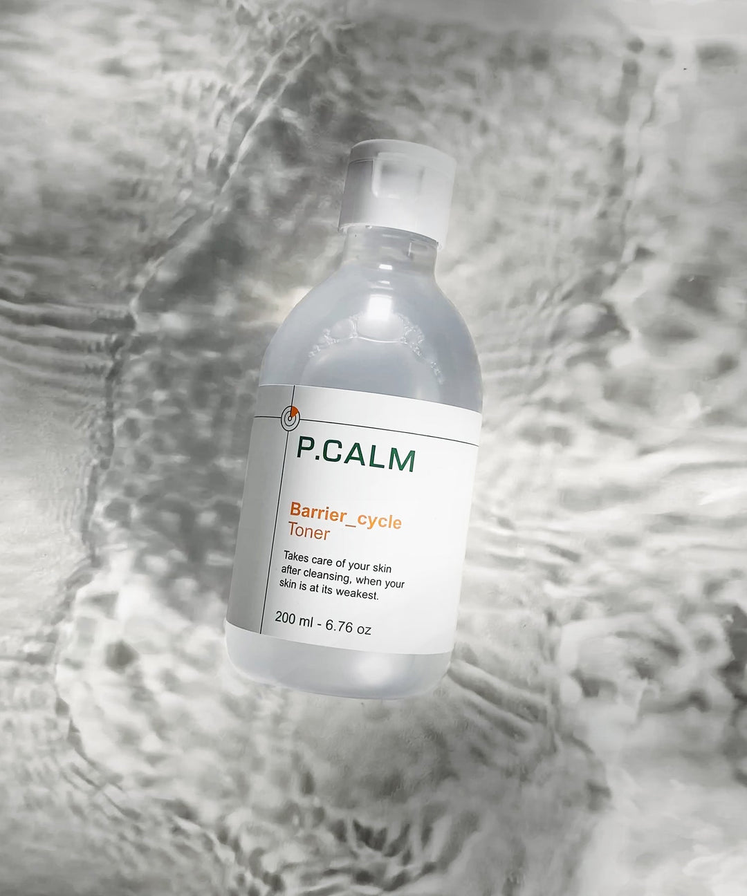 P.CALM Barrier Cycle Toner 200ml bottle with a sleek design, formulated for sensitive and acne-prone skin, featuring key ingredients like Azulene, Centella Asiatica, and Tea Tree to soothe, hydrate, and strengthen the skin barrier. 
