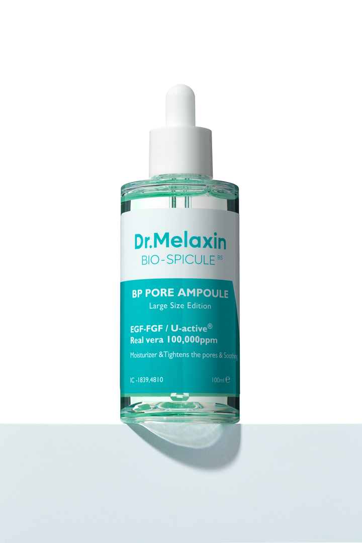 Dr. Melaxin BP Pore Ampoule 30ml bottle with dropper, designed for pore reduction and skin brightening, featuring micro needle bio-spicules technology. 