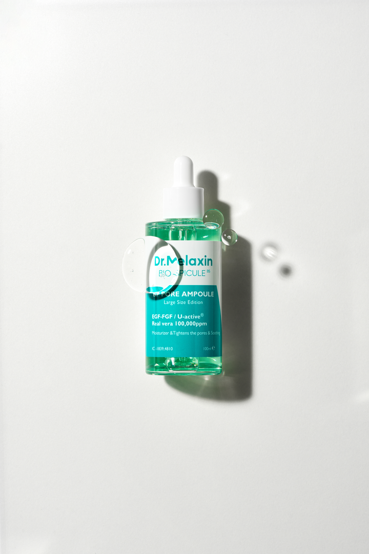 Dr. Melaxin BP Pore Ampoule 30ml bottle with dropper, designed for pore reduction and skin brightening, featuring micro needle bio-spicules technology. 