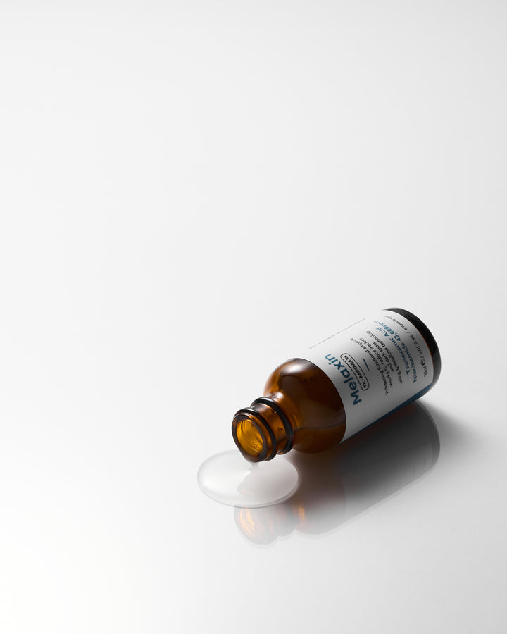 Dr.Melaxin TX Ampoule Rx 30ml - Advanced dark spot correcting serum with Tranexamic Acid and 43,000 ppm Niacinamide to reduce freckles and brighten skin tone. 