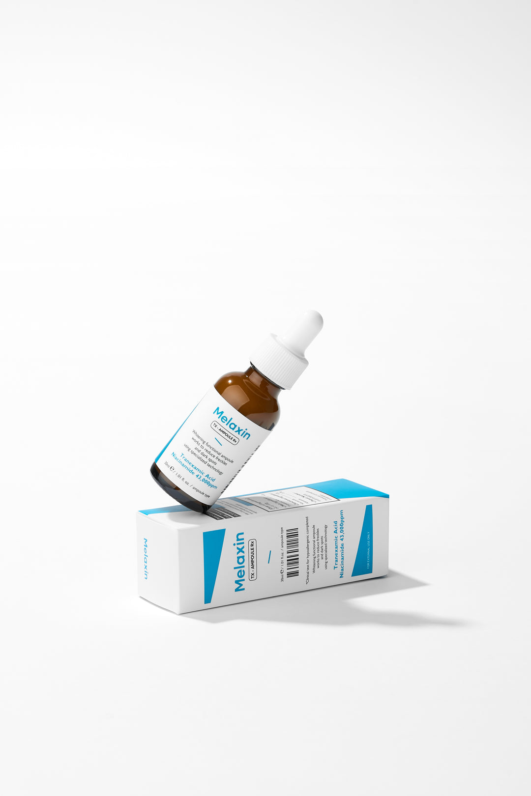 Dr.Melaxin TX Ampoule Rx 30ml - Advanced dark spot correcting serum with Tranexamic Acid and 43,000 ppm Niacinamide to reduce freckles and brighten skin tone. 