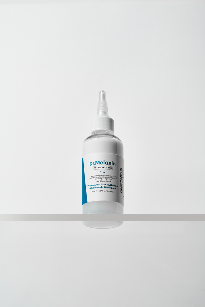 Dr.Melaxin TX Peeling Toner 150ml bottle with label highlighting key ingredients like Tranexamic Acid, Niacinamide, and Hyaluronic Acid, designed for skin brightening and gentle exfoliation. 