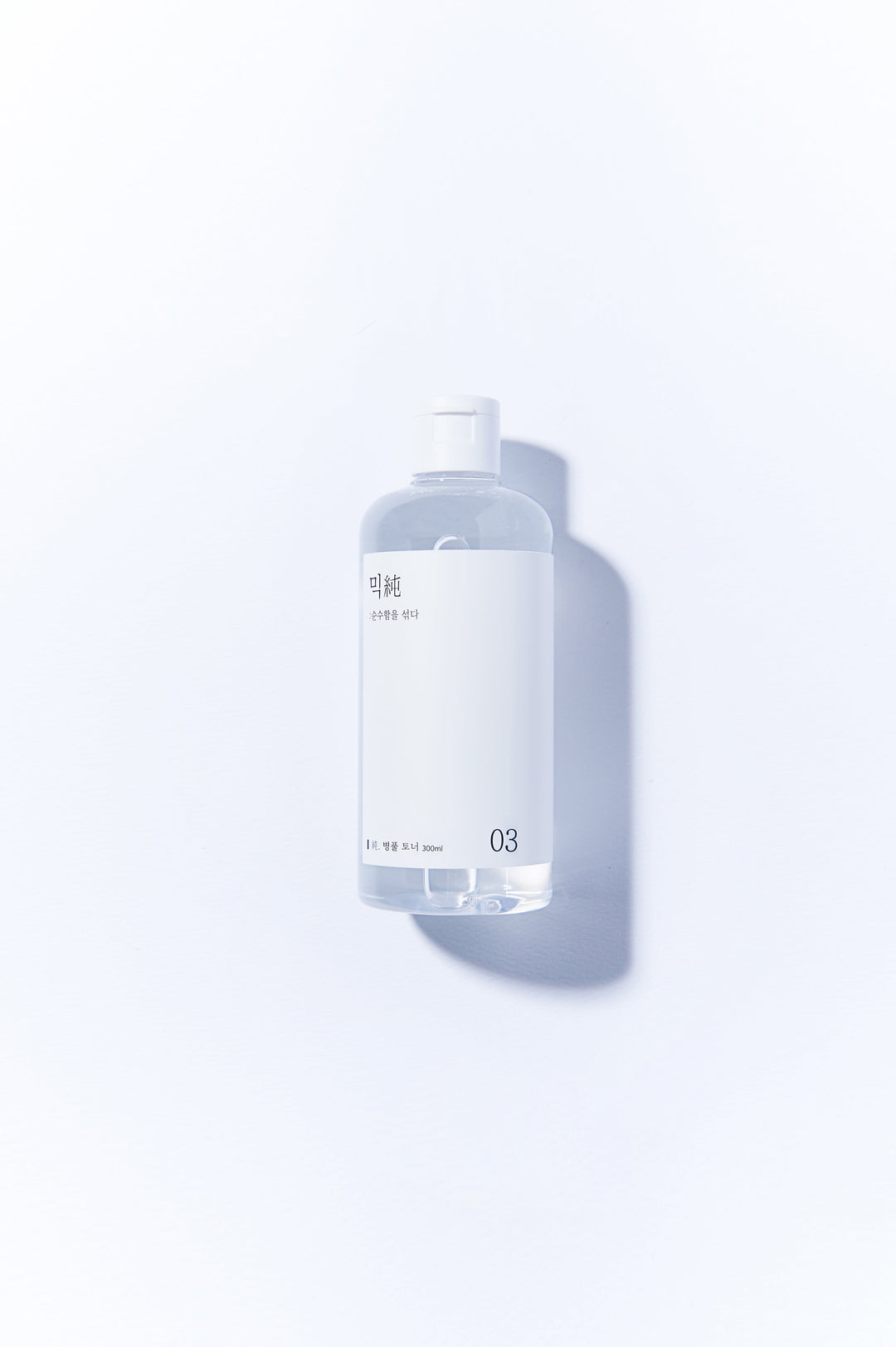 Mixsoon Centella Asiatica Toner 300ml bottle with label featuring product name and description, designed for soothing and hydrating sensitive, acne-prone skin. 